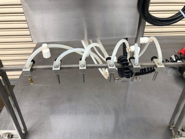 Accutek Mini Pinch Semi-Auto Bottle Filling Line