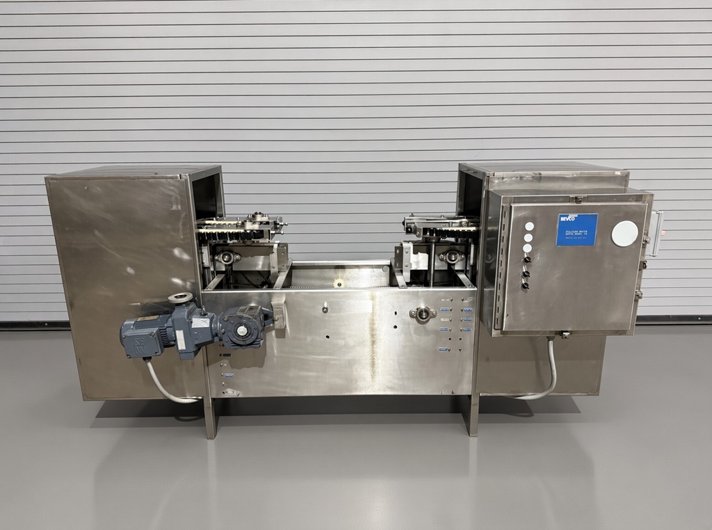 BEVCO M100 AUTOMATIC INLINE GRIPPER BOTTLE RINSER, CAP STERILIZER